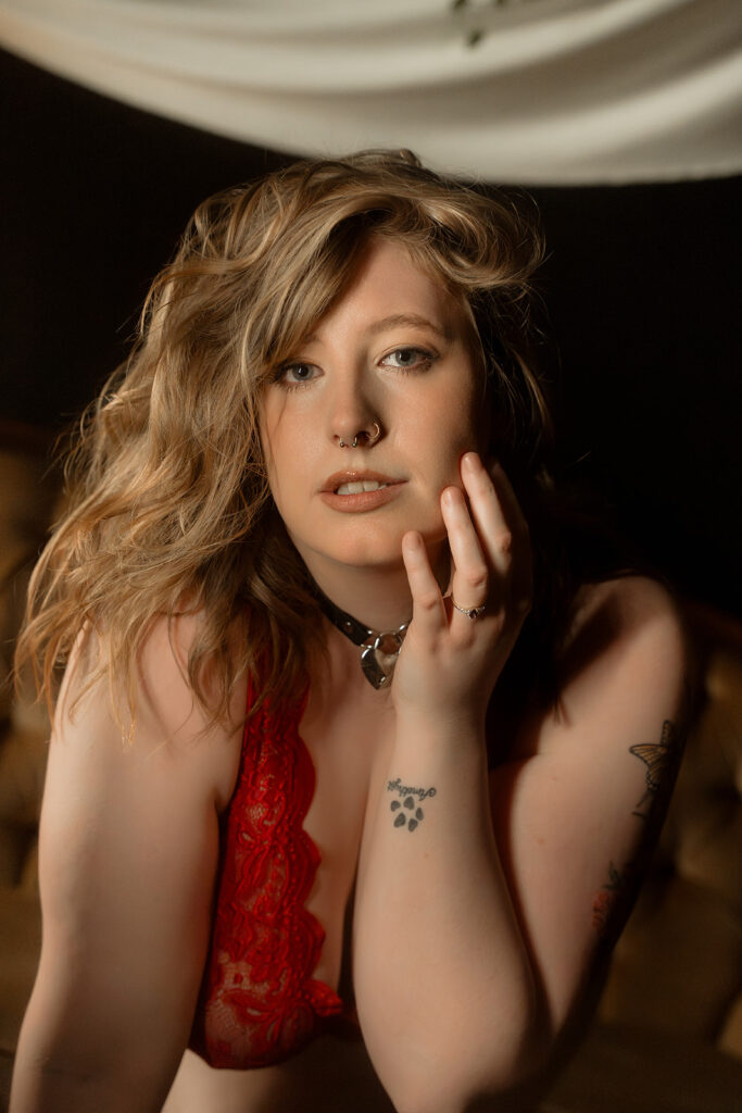 A portrait of a women looking into the camera at Apricot Aura during her boudoir photography near Melbourne