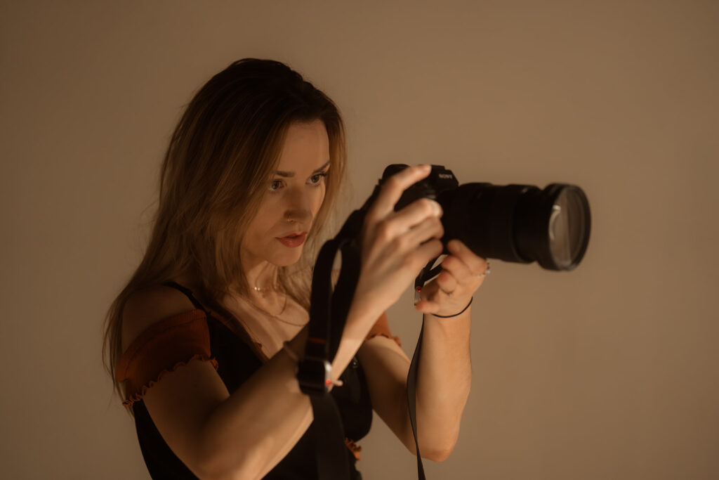 Sabrina taking photos of a client at Apricot Aura in Geelong